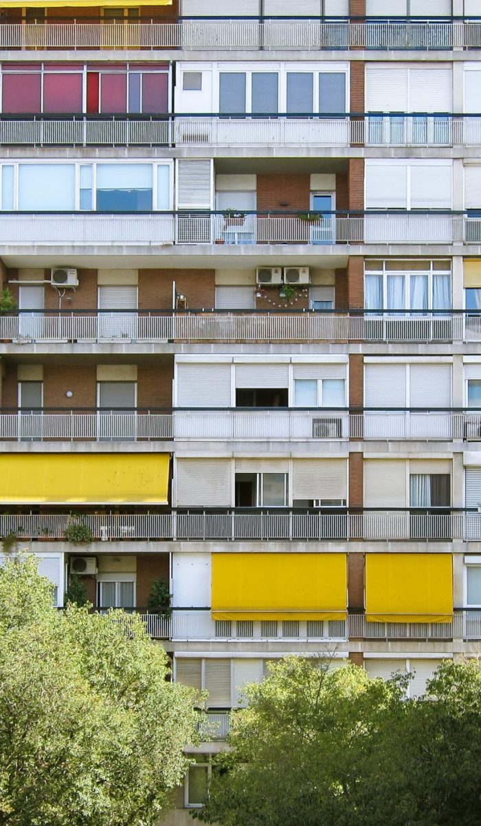 A beautiful symmetric shot of a long apartment building