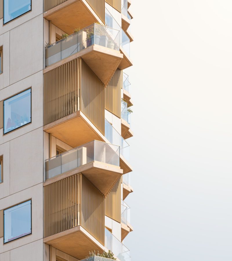 A vertical shot of a beautiful modern building under the bright sky